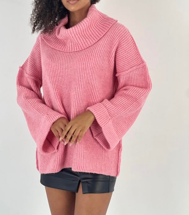 Pull oversize col roulé rose